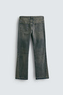 JEANS MET UITLOPENDE PIJPEN
