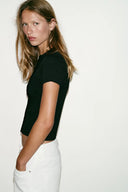 TRICOT TOP MET ASYMMETRISCHE SLUITING