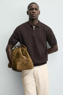 TRICOT POLO MET RITS