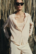TRICOT VEST MET BINNENTOP