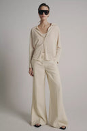 TRICOT VEST MET BINNENTOP