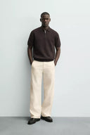 TRICOT POLO MET RITS