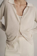 TRICOT VEST MET BINNENTOP
