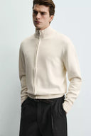 TRICOT VEST MET RITS