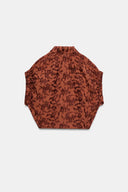 GEBORDUURDE TOP MET ELASTIEK