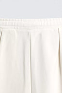 JOGGINGBROEK WIDE FIT MET PLOOIEN  Ecru