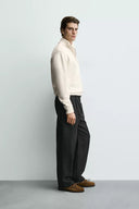 TRICOT VEST MET RITS