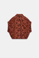 GEBORDUURDE TOP MET ELASTIEK