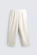 JOGGINGBROEK WIDE FIT MET PLOOIEN  Ecru