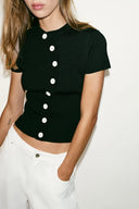 TRICOT TOP MET ASYMMETRISCHE SLUITING