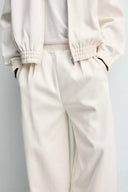 JOGGINGBROEK WIDE FIT MET PLOOIEN  Ecru