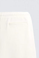 JOGGINGBROEK WIDE FIT MET PLOOIEN  Ecru