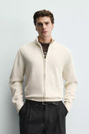 TRICOT VEST MET RITS