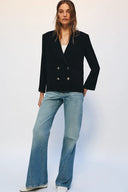 RELAXED FLARE JEANS MET LAGE TAILLE