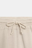 SHORT MET KOORDJES IN VERWASSEN LOOK