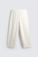 JOGGINGBROEK WIDE FIT MET PLOOIEN  Ecru